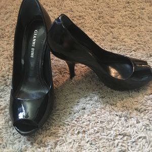 Black patent leather peep toe heels